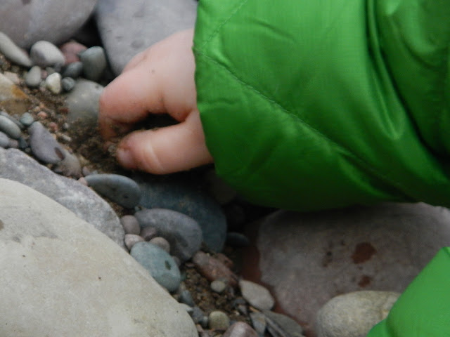 toddler playing in the dirt blackfoot river montana