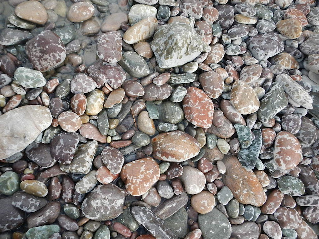 colorful rocks in the rain blackfoot river montana